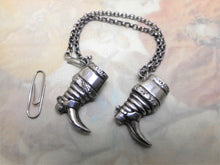 Load image into Gallery viewer, A pair of Dutch boot shaped knitting needle protectors.