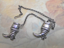 Load image into Gallery viewer, SOLD……..A pair of silver boot knitting needle retainers. Continental. c 1860