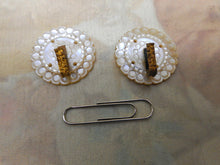 Charger l'image dans la galerie, A pair of mother of pearl cloak clasps.