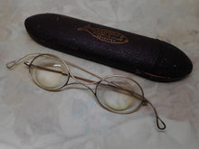 Load image into Gallery viewer, A pair of old corrective spectacles / eye glasses.