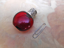 Load image into Gallery viewer, A small ruby glass scent / salts bottle with an embossed silver lid.  19thc