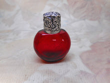 Load image into Gallery viewer, A small ruby glass scent / salts bottle with an embossed silver lid.  19thc