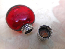 Load image into Gallery viewer, A small ruby glass scent / salts bottle with an embossed silver lid.  19thc