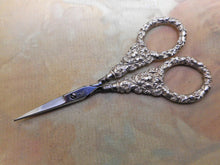 Charger l'image dans la galerie, A pair of embossed silver handled embroidery scissors. 19th century.