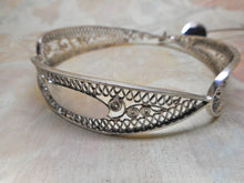 Load image into Gallery viewer, A 19th century Dutch silver filigree bangle and wool hook.