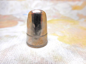 A Georgian silver finger guard / thimble. Maker WW. c1800