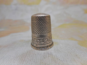 A French silver thimble from an etui. c1870