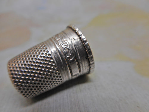 A French silver thimble from an etui. c1870