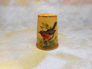 A Worcester blush ivory porcelain 'bird' thimble.  c1870-1890