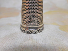 Load image into Gallery viewer, A German silver thimble with patterned rim. c1920
