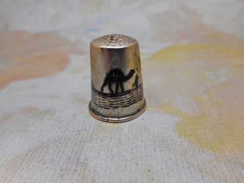 A silver Iraqi Marsh Arab thimble. c1920