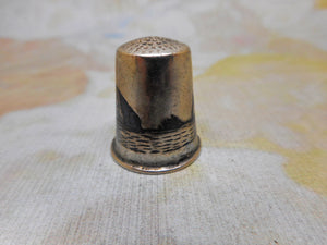 A silver Iraqi Marsh Arab thimble. c1920