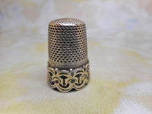 Load image into Gallery viewer, A silver thimble with a raised decorative border. c1870

