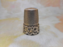 Load image into Gallery viewer, A silver thimble with a raised decorative border. c1870

