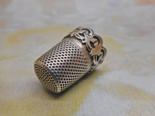 Load image into Gallery viewer, A silver thimble with a raised decorative border. c1870
