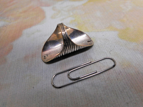 Antique Dutch silver thimble or finger guard.