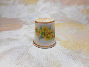 A child's porcelain thimble. c 1870