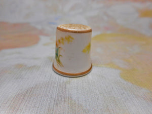 A child's porcelain thimble. c 1870