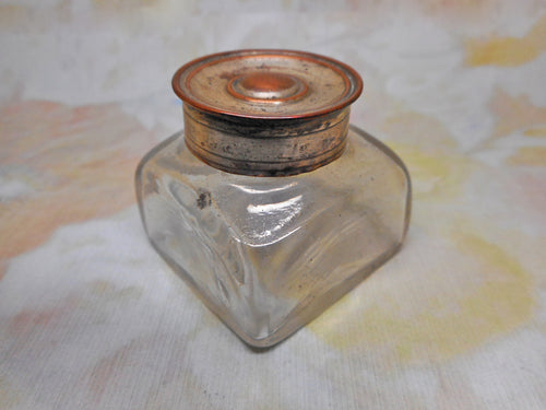 A glass ink well from a Georgian writing box. c 1820