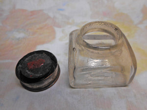 A glass ink well from a Georgian writing box. c 1820