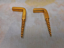 Load image into Gallery viewer, A pair of gilt steel pegs from a Georgian gentleman&#39;s dressing box. c1800-1820
