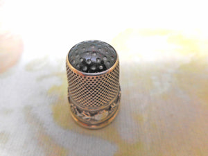 A Continental decorative silver thimble with stone top. c 1870