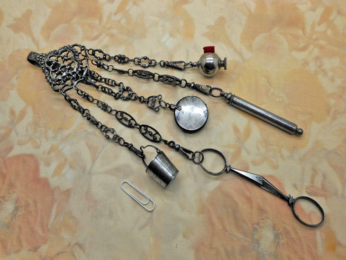 A Victorian cut steel sewing chatelaine. c 1850