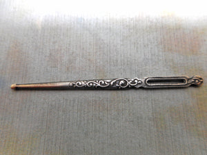 A French silver bodkin / ribbon threader. c1870.