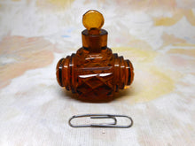 Load image into Gallery viewer, An amber glass scent bottle of barrel form. c 1830
