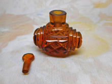 Load image into Gallery viewer, An amber glass scent bottle of barrel form. c 1830
