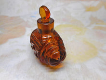 Load image into Gallery viewer, An amber glass scent bottle of barrel form. c 1830
