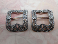 A pair of paste set silver shoe buckles. Early 19thc