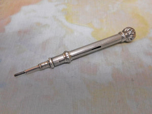 A short silver propelling pencil c1830