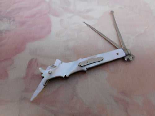 A pearl tooth pick and earspoon combination tool. c 1830