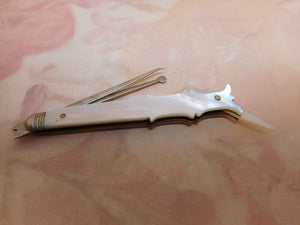 A pearl tooth pick and earspoon combination tool. c 1830