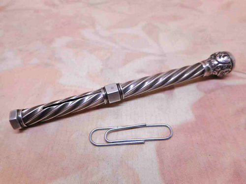 A silver 'barley twist' propelling pencil. c 1880