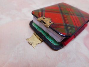 A Tartan Ware pocket note book. Stuart. c 1840