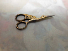 Load image into Gallery viewer, A tiny pair of gilt steel stork scissors. 20thc
