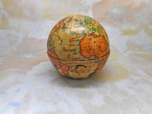 A novelty globe travelling inkwell. c1900