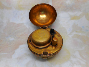 A novelty globe travelling inkwell. c1900