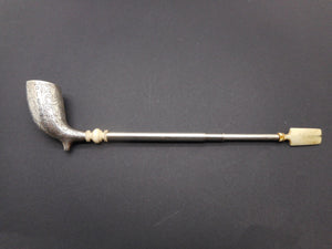 An engraved silver pipe. George Unite 1861