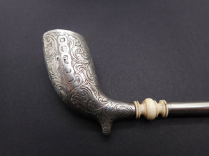 SOLD…….…..An engraved silver pipe. George Unite 1861