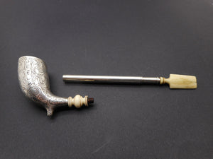 SOLD…….…..An engraved silver pipe. George Unite 1861