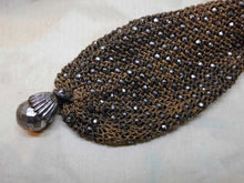 Load image into Gallery viewer, A brown netted miser&#39;s purse with steel beads. 19th century.
