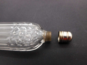 A cut glass scent bottle with silver lid. Georgian. c1830