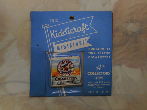 An original display card for 'Players' toy cigarettes by Kiddicraft.