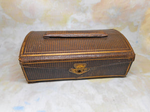 A small leather etui with steel sewing tools. c 1880