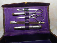 Load image into Gallery viewer, A small leather etui with steel sewing tools. c 1880
