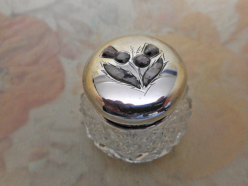 A small glass pot the silver lid set with stone thistles. HM. 1904