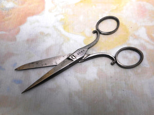 A pair of 19th century steel scissors. Lund cutler.